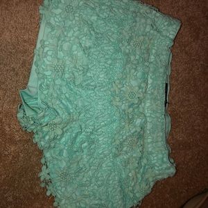 Mint green ruffled shorts